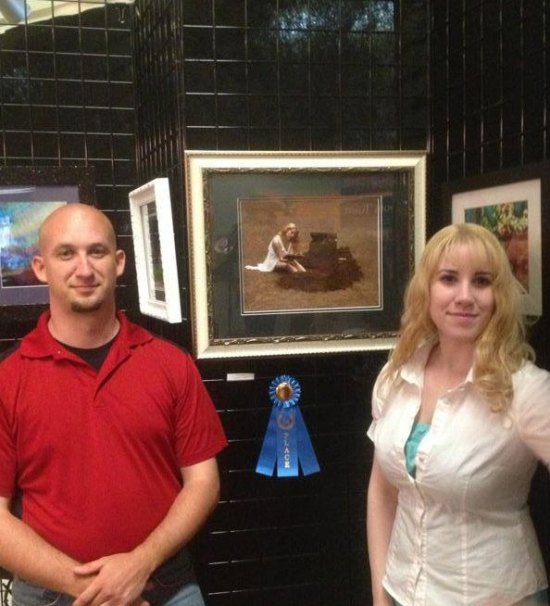 Model, Photographer Duo Compete in National Juried Museum Exhibit Tonight Chris Hayes and Elsa Littlepage pose at Highlands exhibit in Ashland.